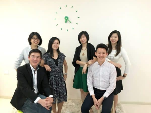 Michael Tee, CEO (Left, front row) and Agnes Siaw, Executive Director (Right, with green skirt) with FundedHere Team[2]