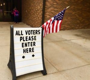 polling-vote-us-flag-small-town