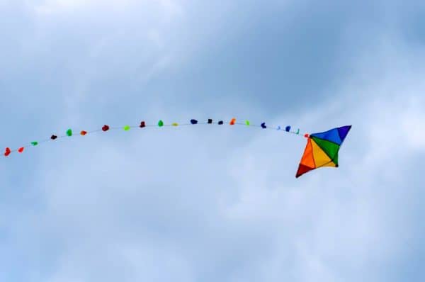 kite-fying-clouds-high